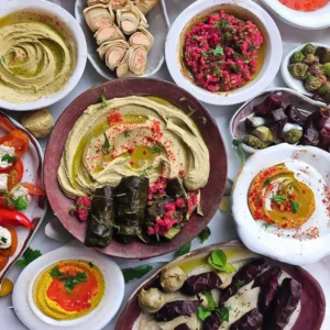[Image: A colorful spread of Turkish meze dishes, including hummus, ezme, and dolma.